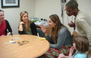 Speech clinic group seated around table